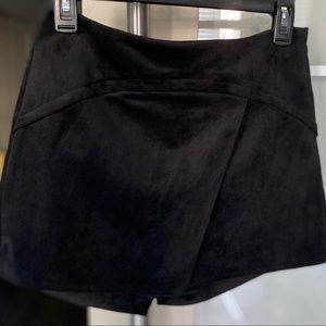 New BCBG black suede like shorts, fully lined.